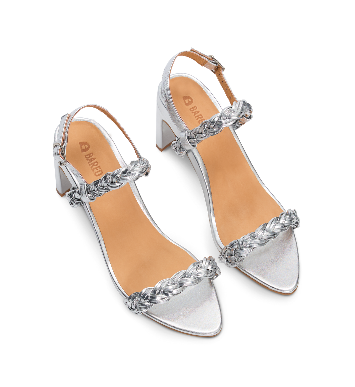 Silver high-heels with braided straps on a white background