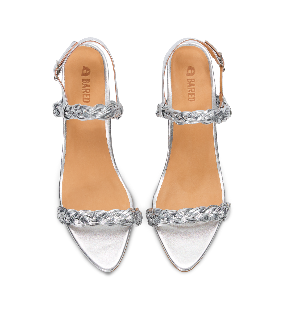 silver heels with silver braided straps on a white background