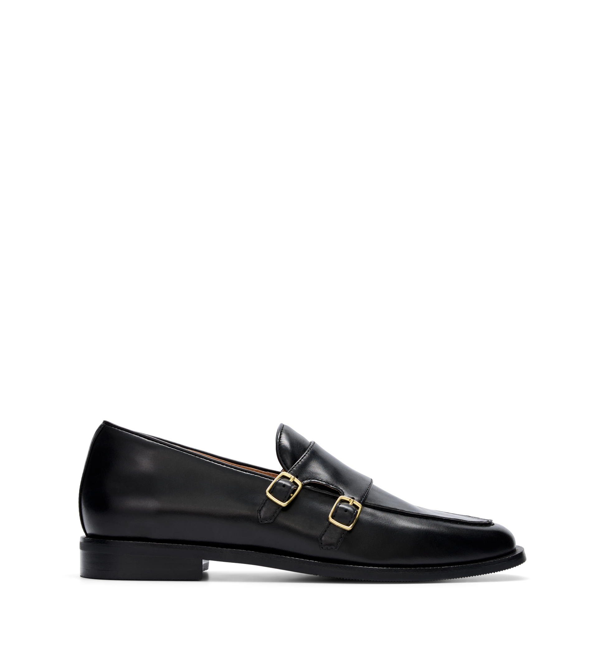 A womens black leather monk shoe with a double strap and gold hardware.