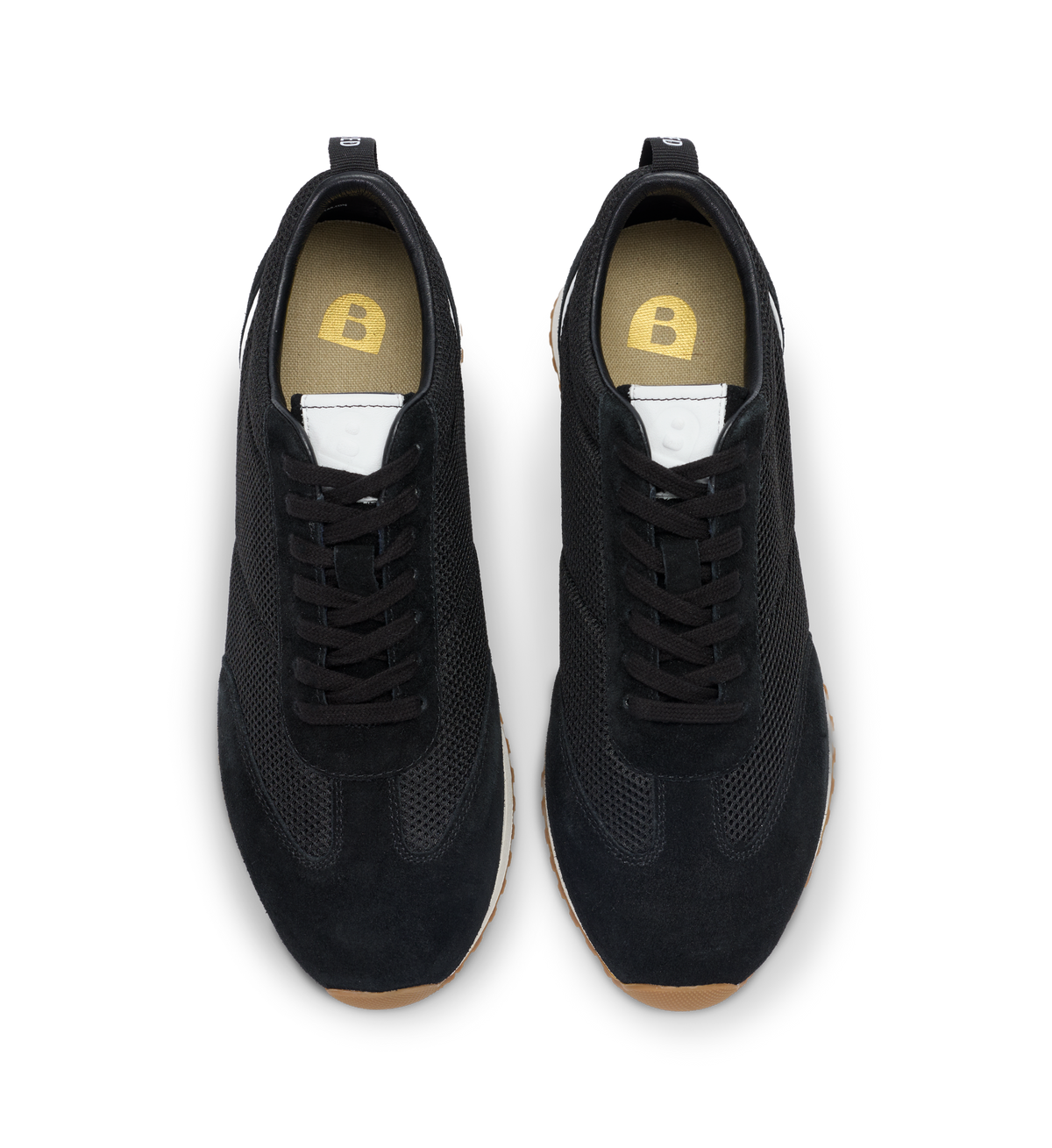 Black sneakers with a brand logo on a white background