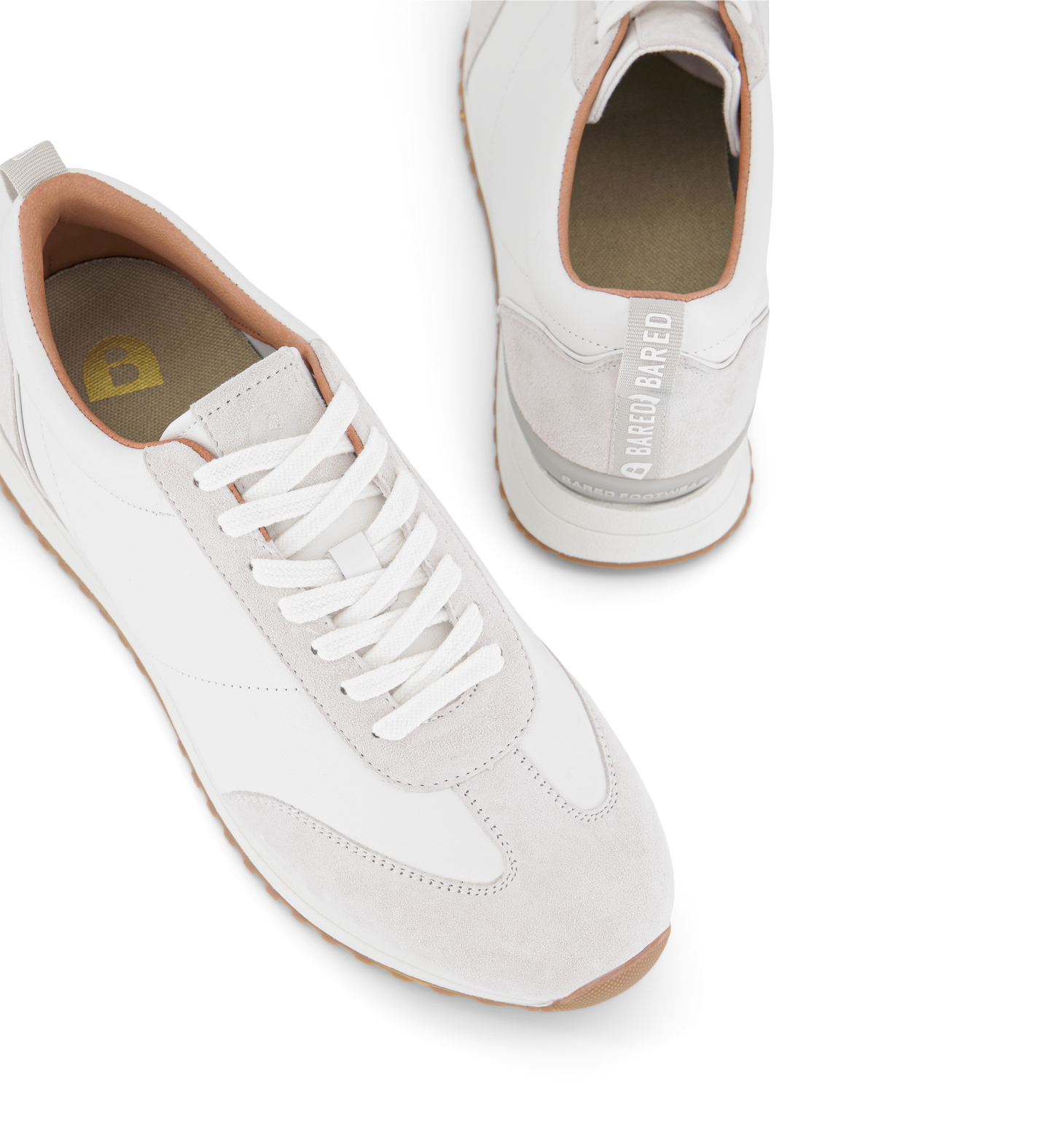 podiatrist designed womens white sneakers on a white background