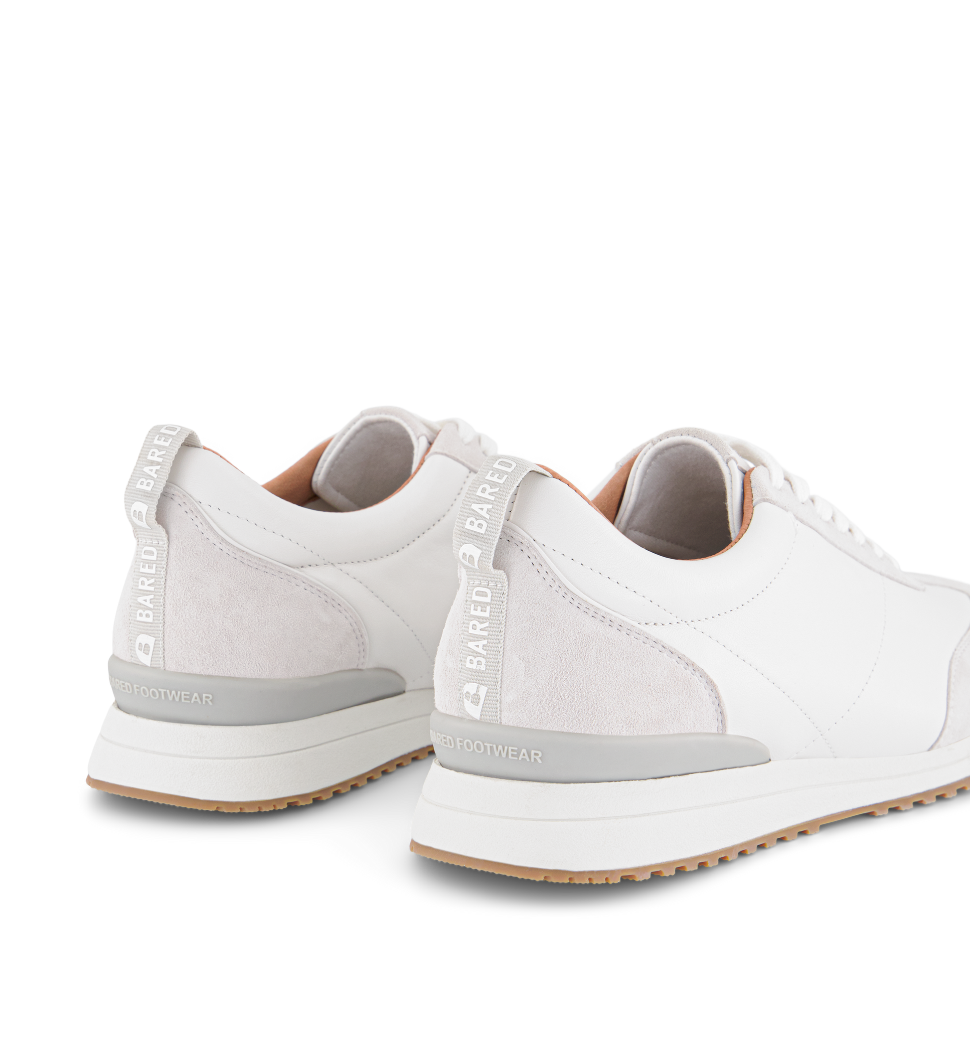 close up on the bared footwear white sneakers