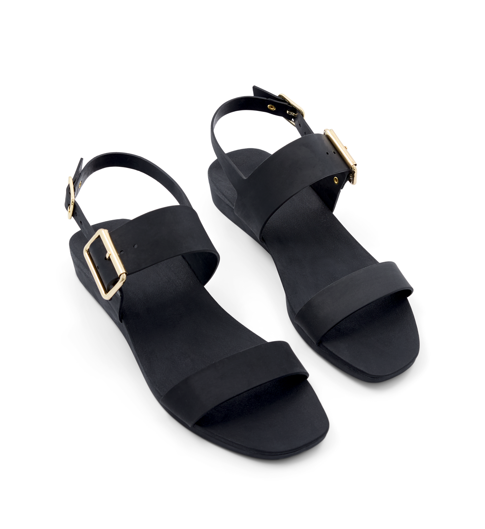 Black sandals with gold buckles on a white background