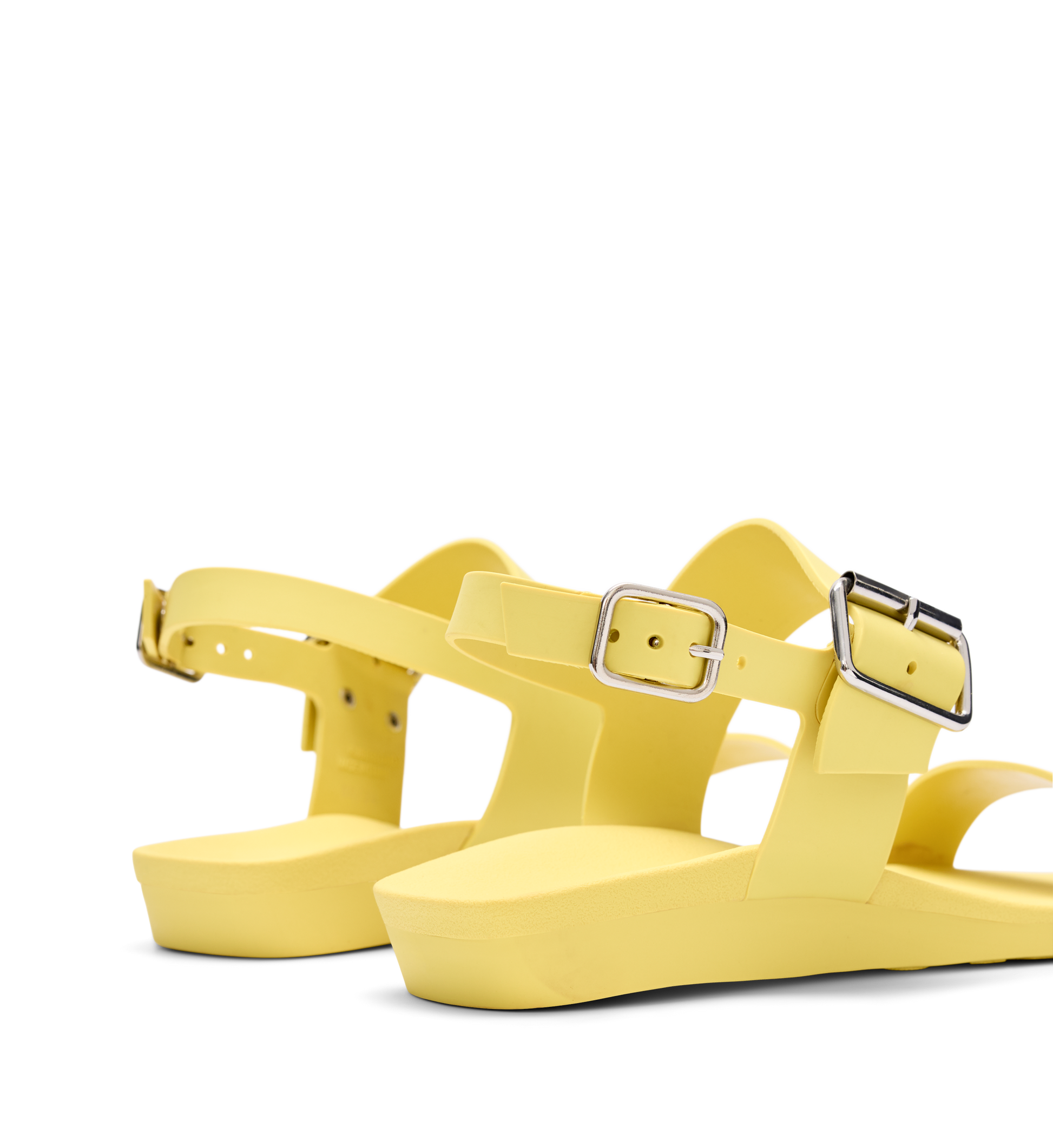 bright yellow sandals with silver buckles