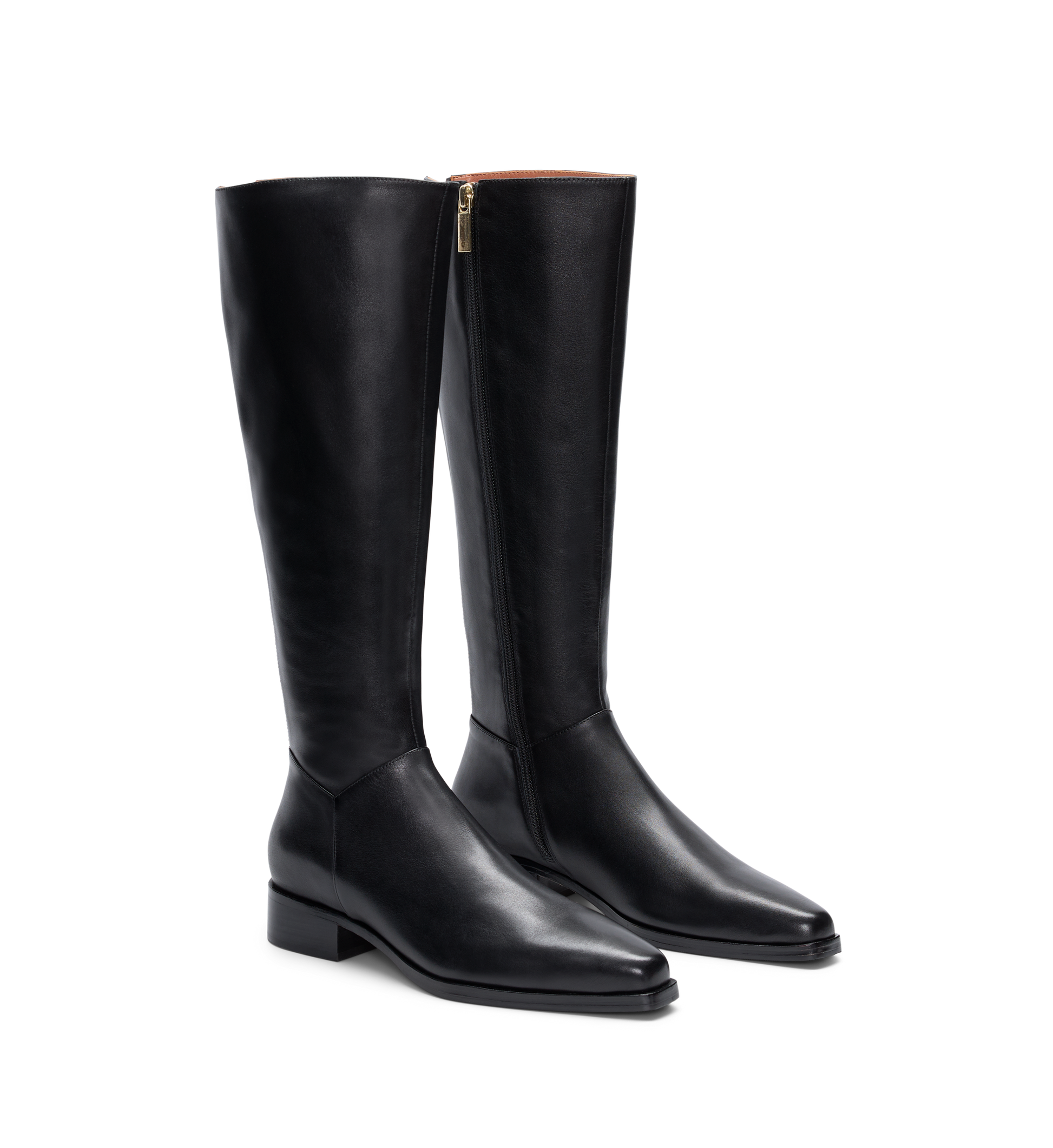 Pair of black knee high boots with zip