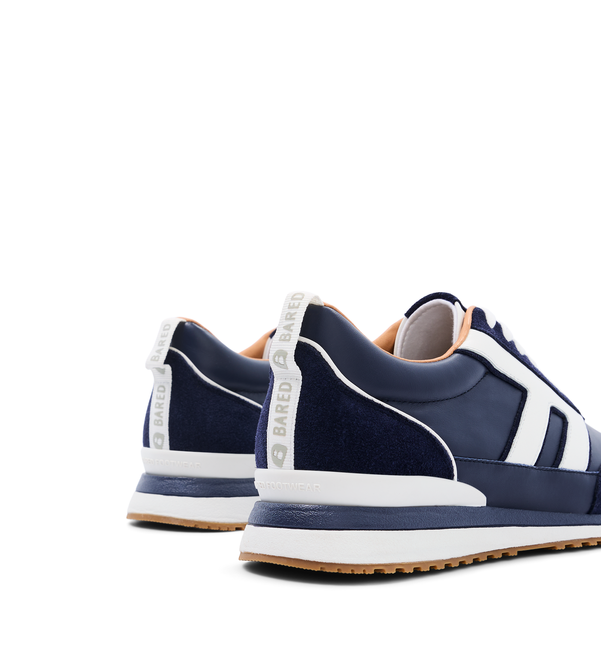 close up on the heel of the bared footwear stork suede sneakers