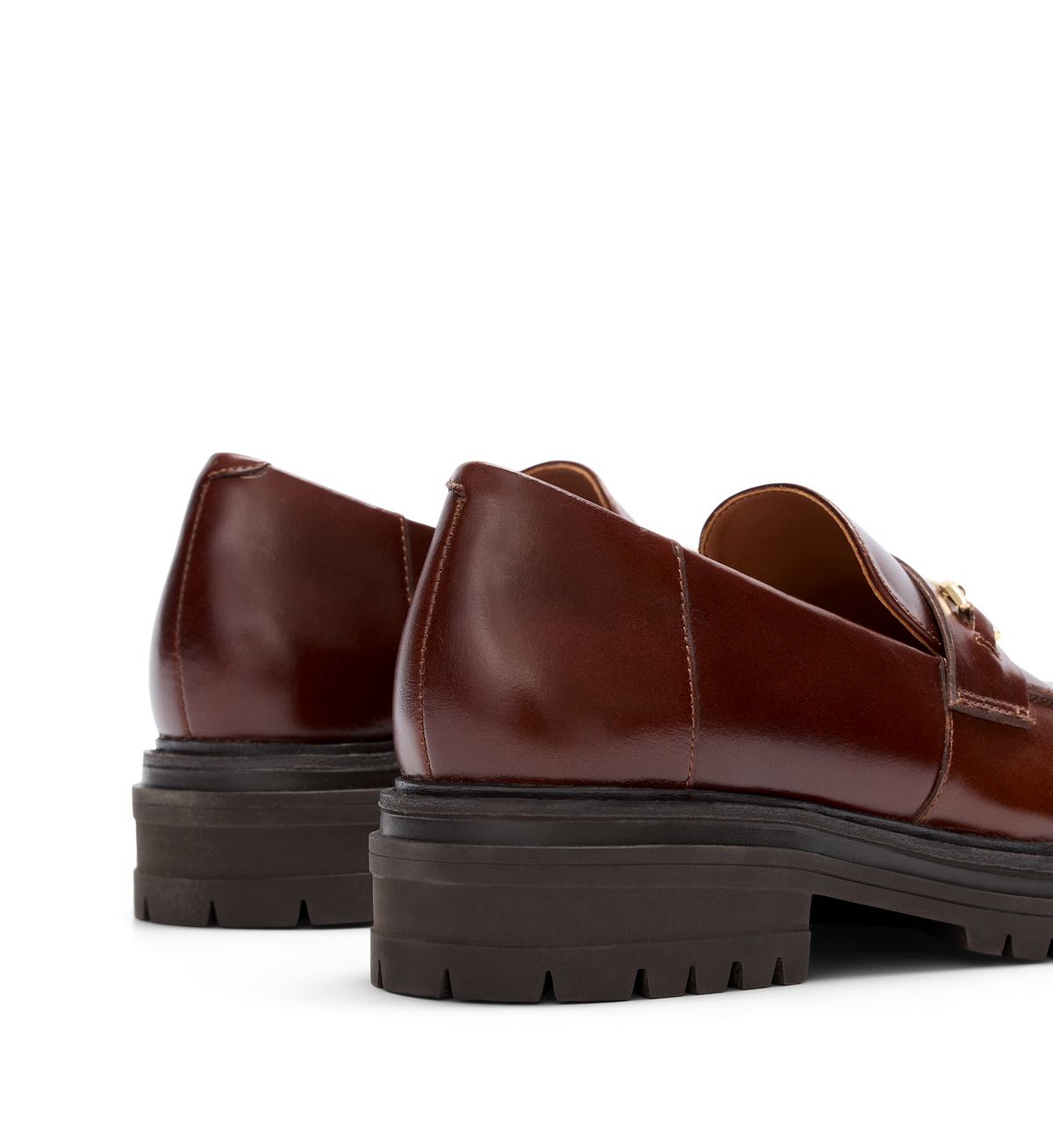 close up on the back of the wedgebill golden tan leather loafers for women