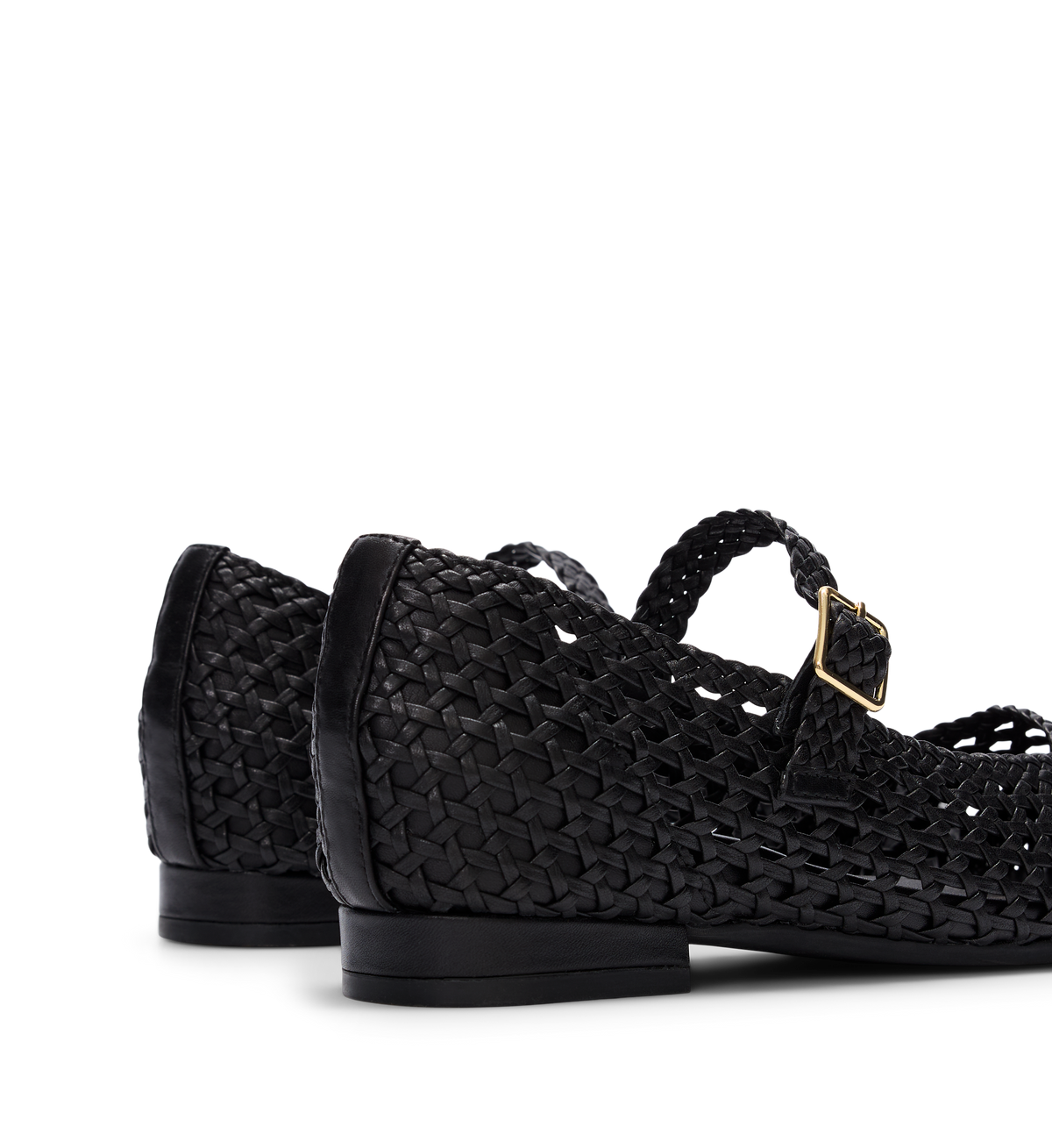close up on the back of the whip black woven leather ballet flats