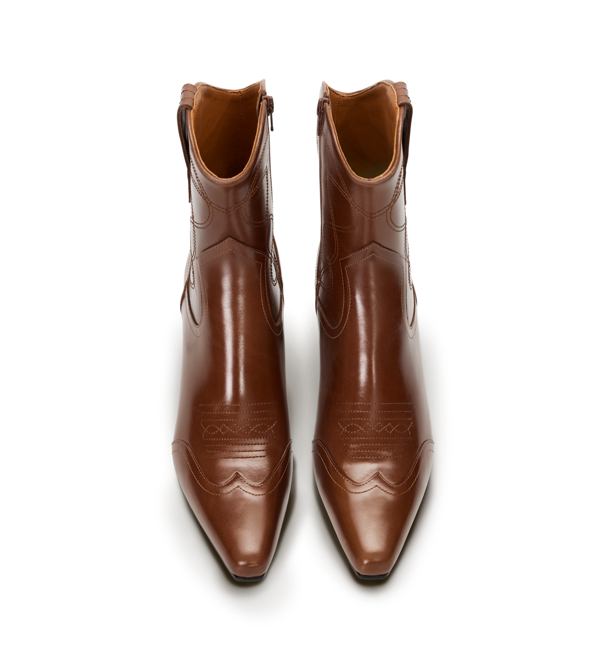 Pair of brown leather boots on a white background