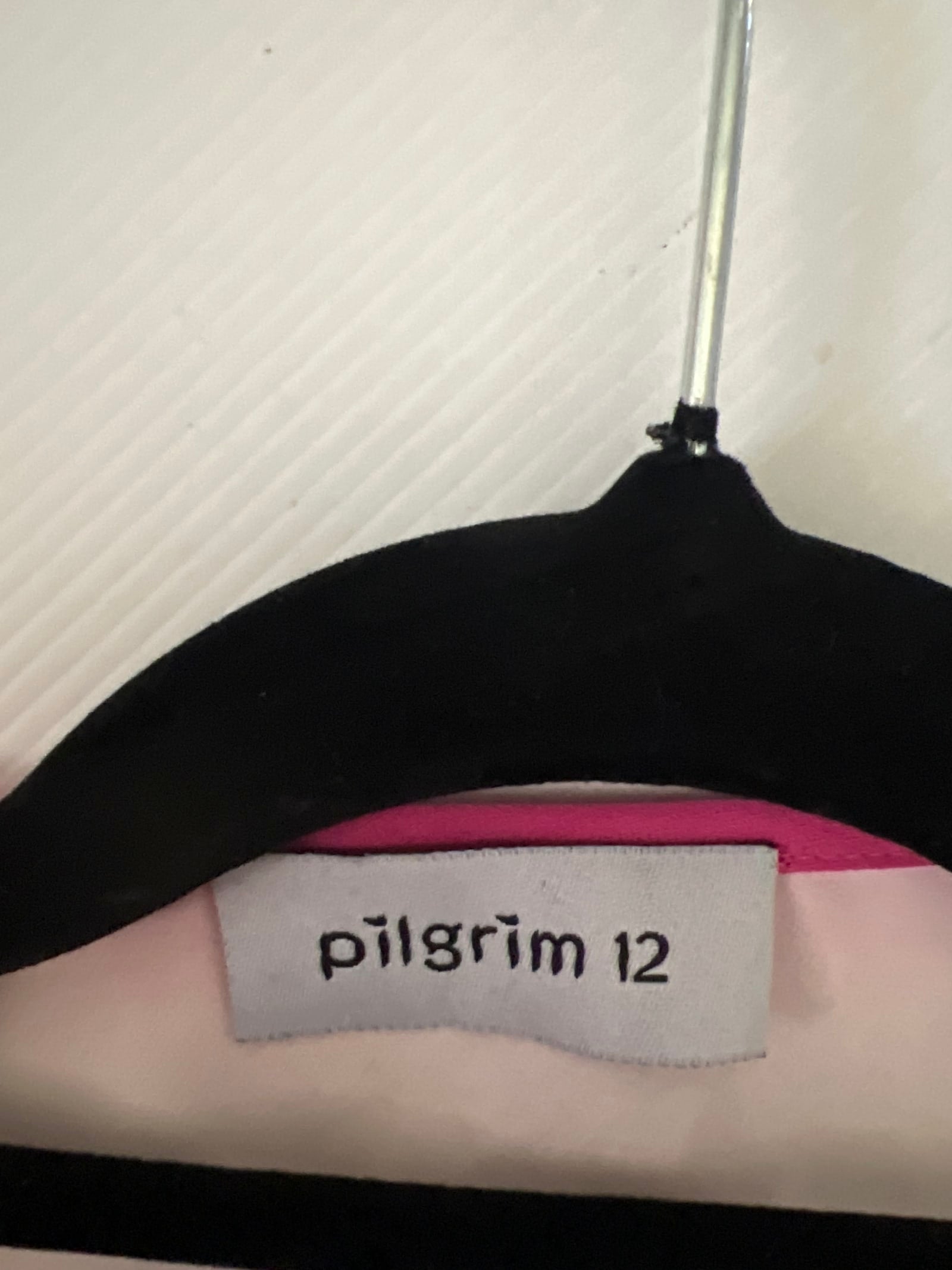 164040