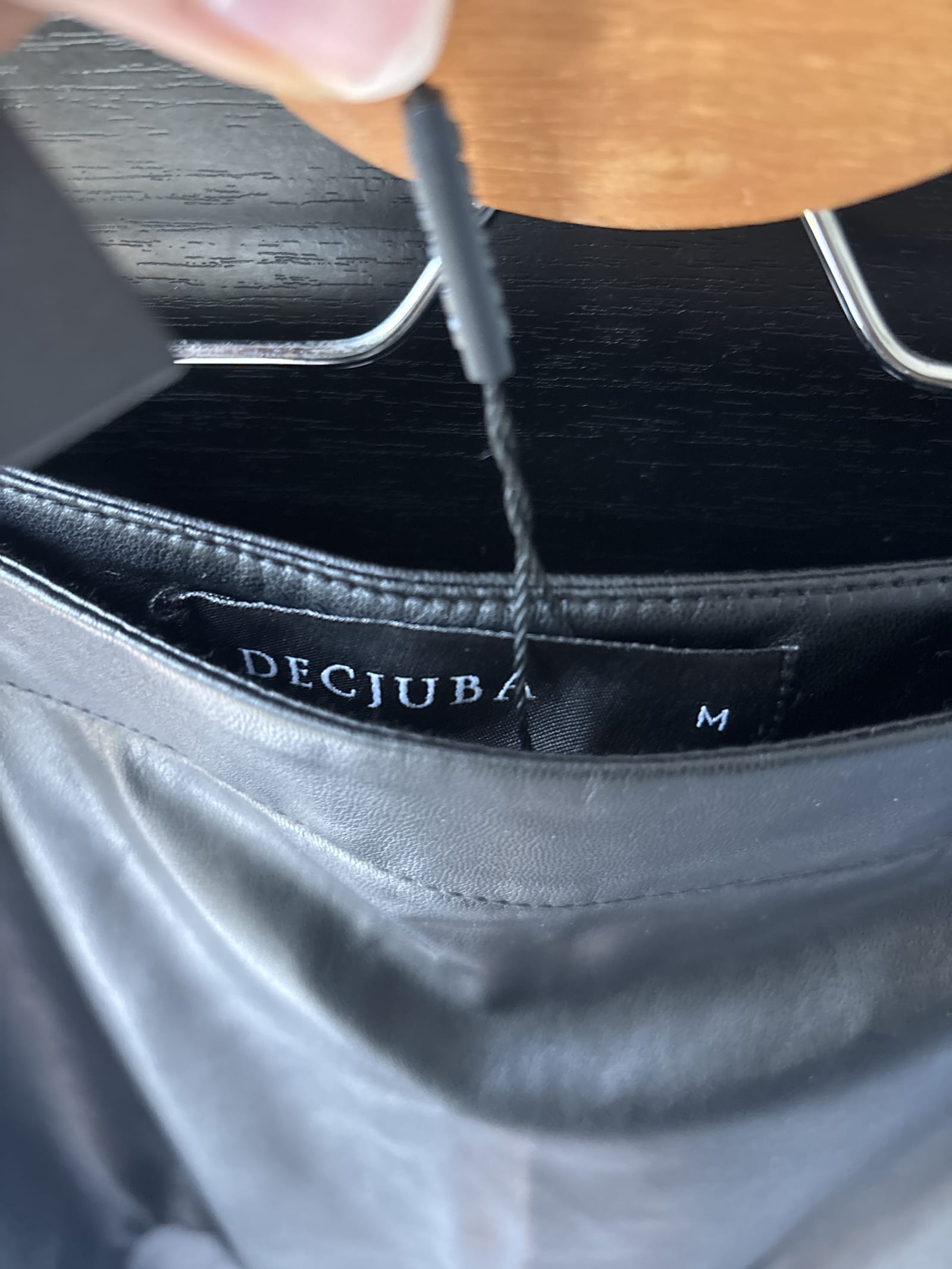 97709