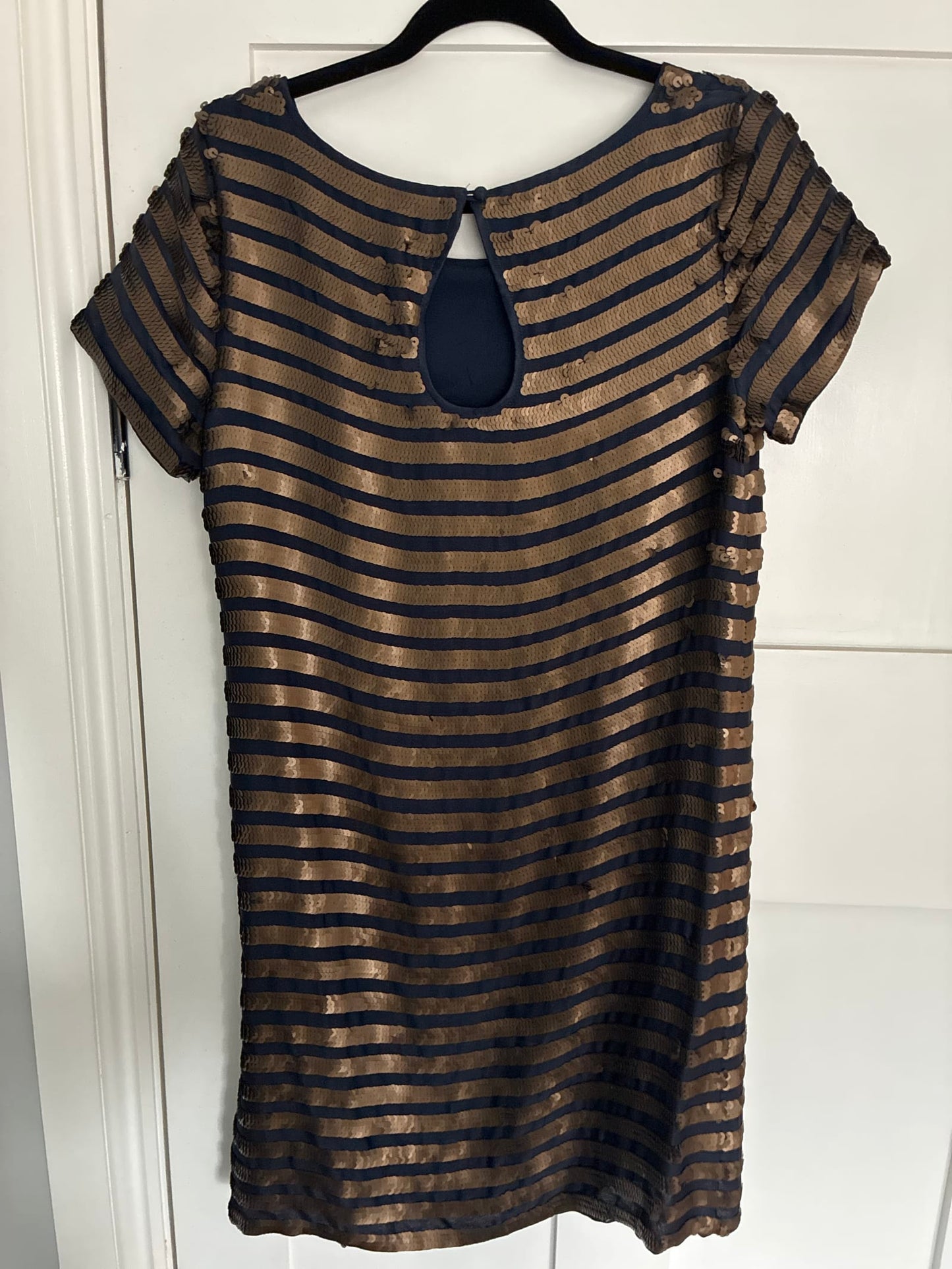 114047