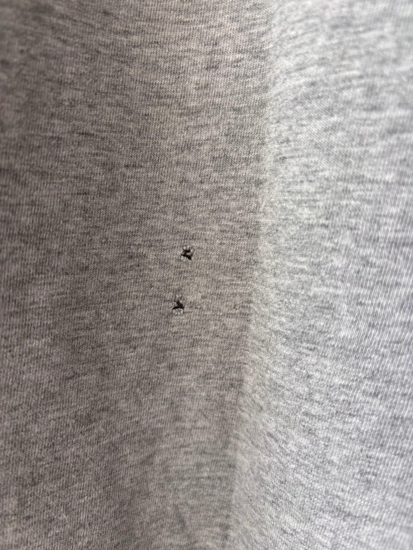 97649