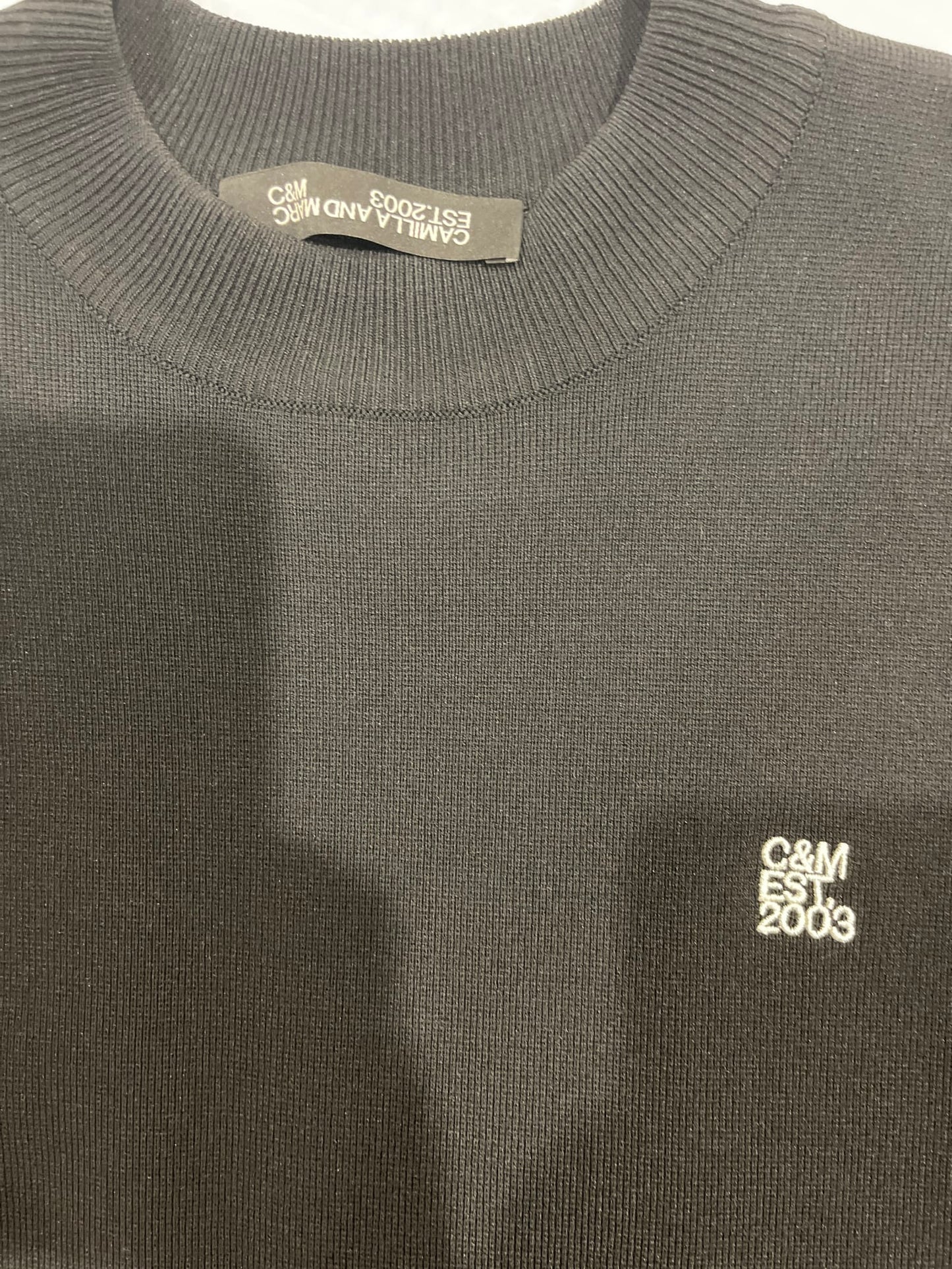 77108