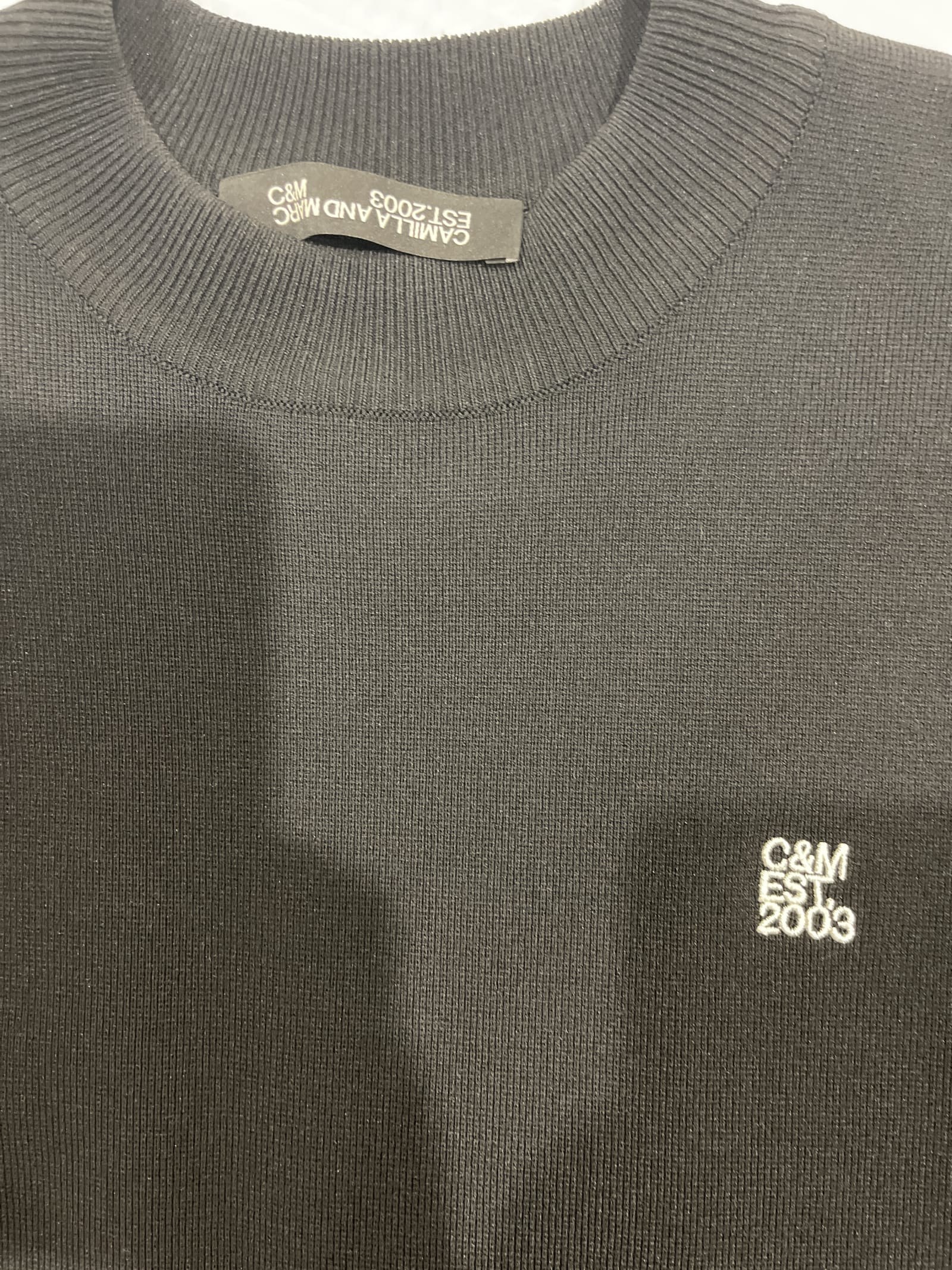 77108