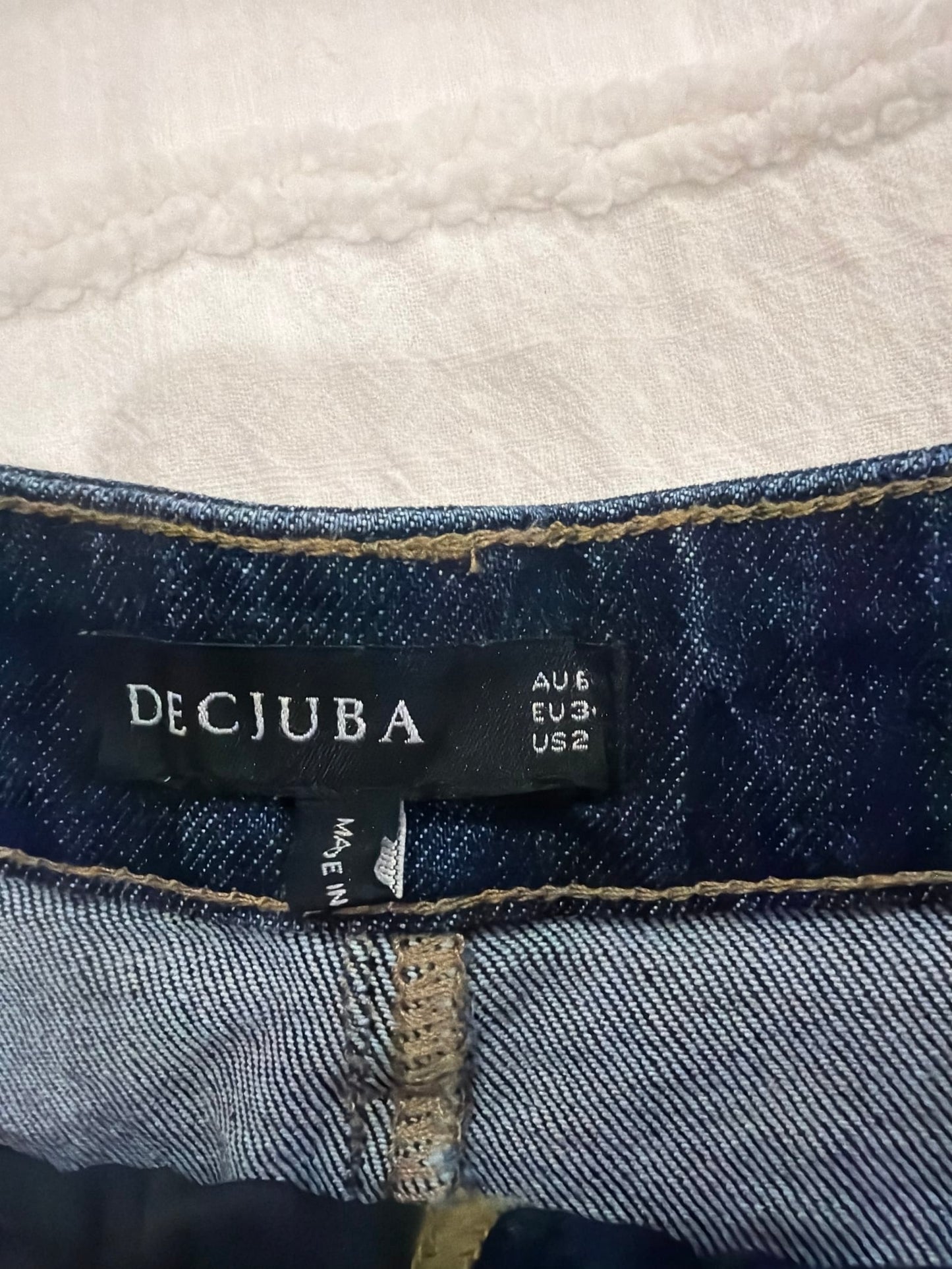 75979