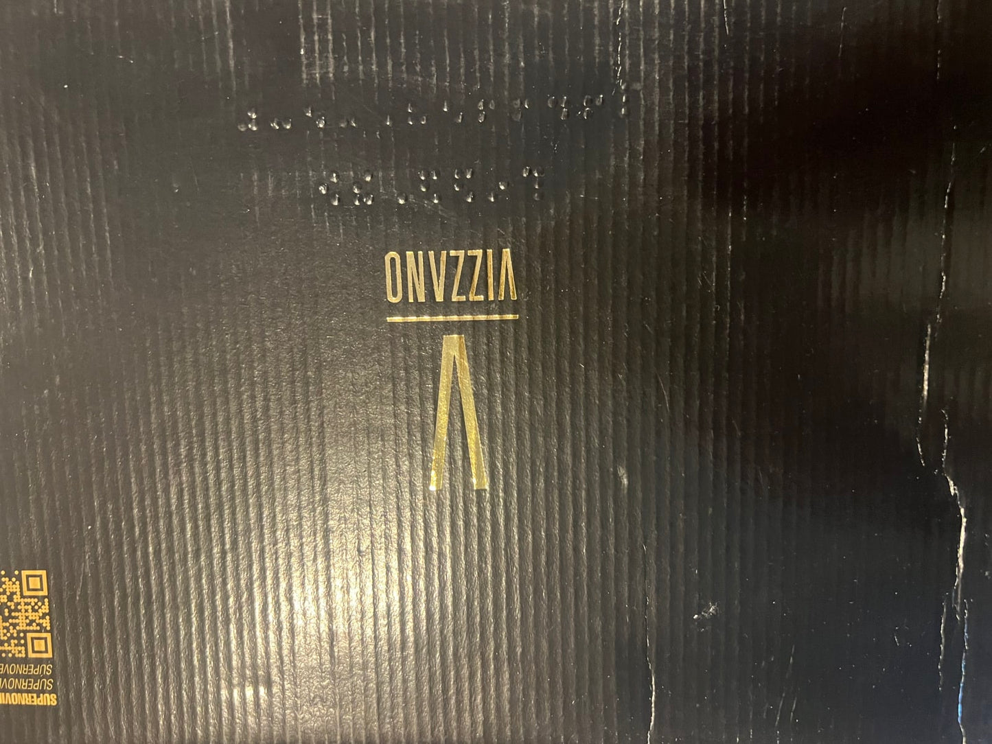 87477