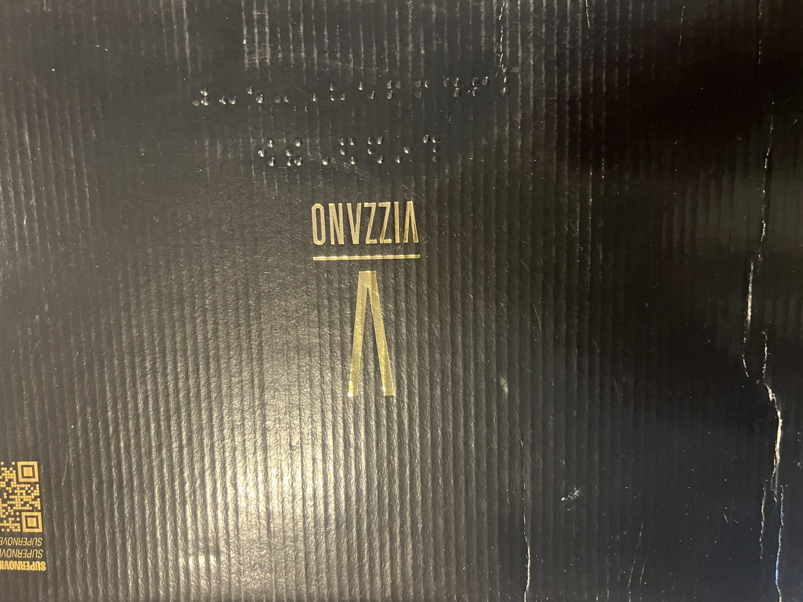 87477