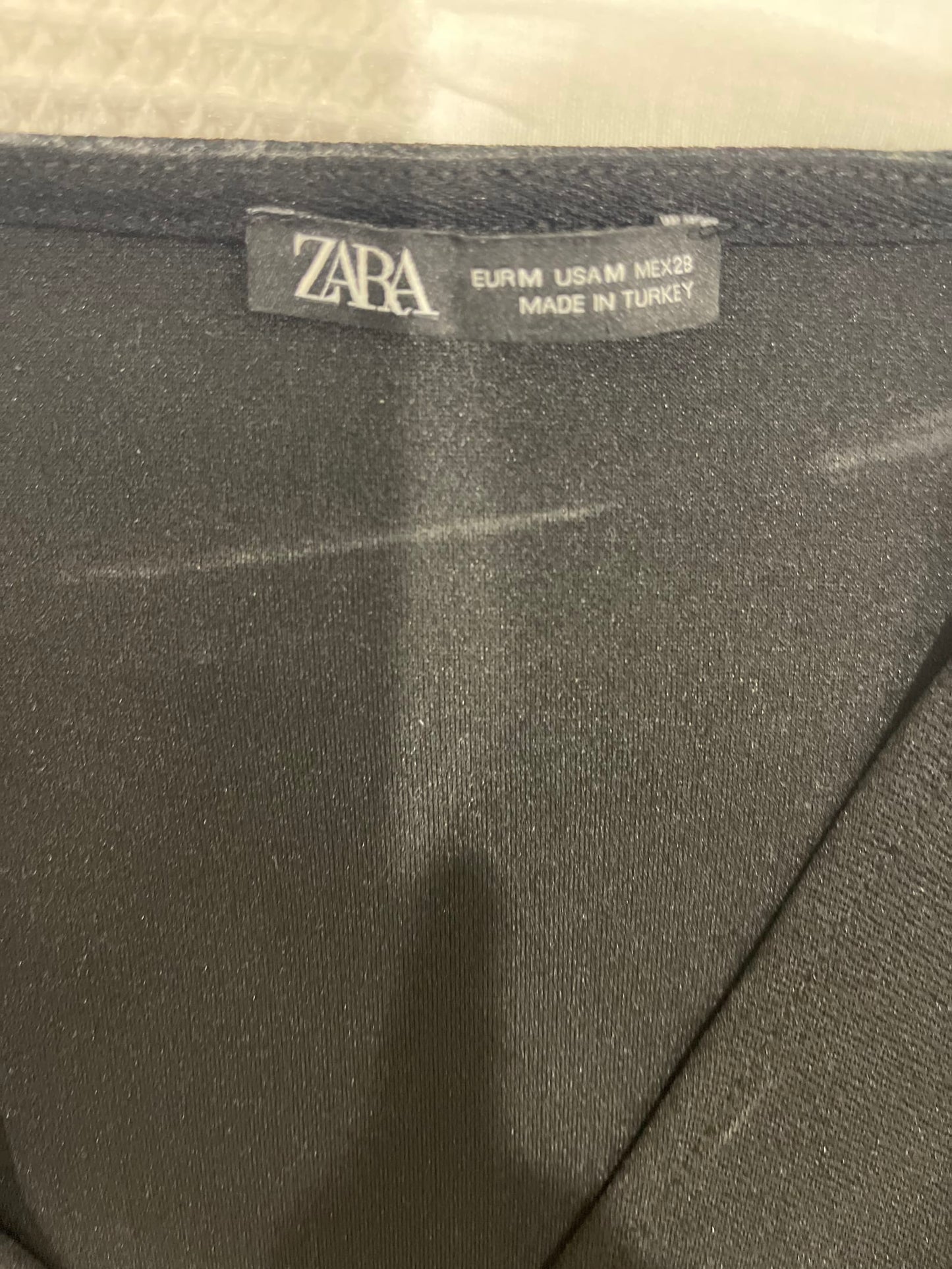 77232