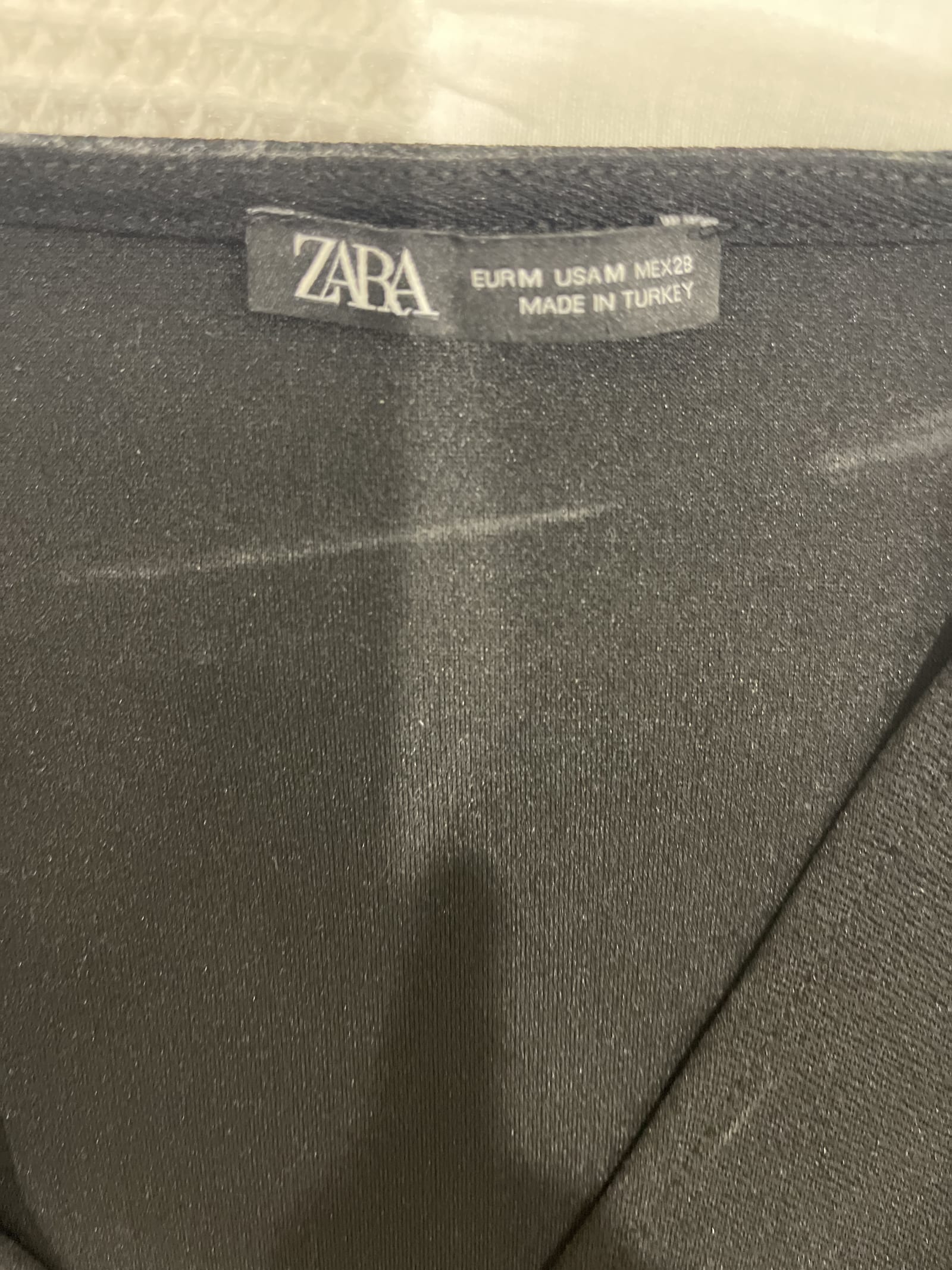 77232