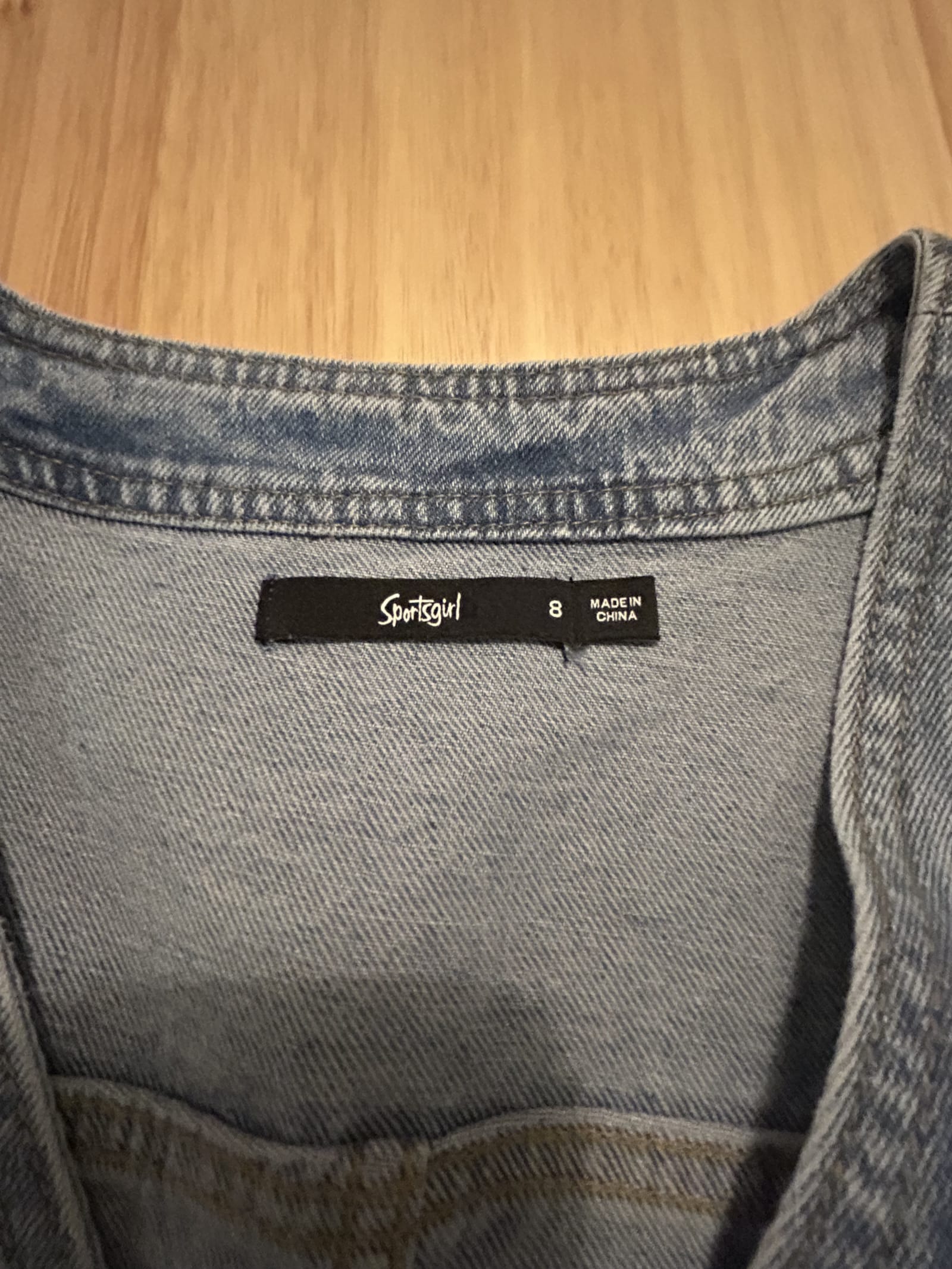 163237