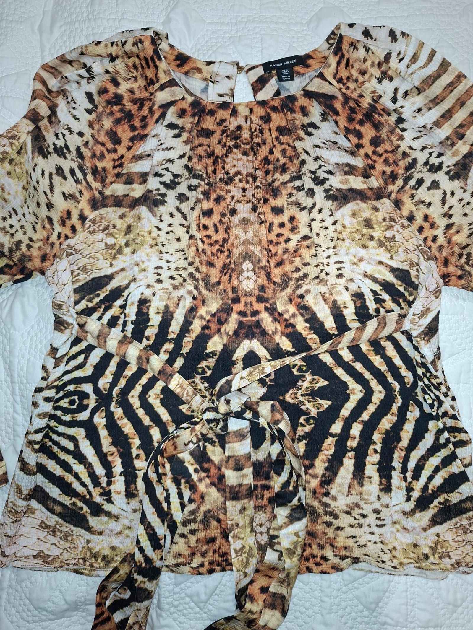 115394